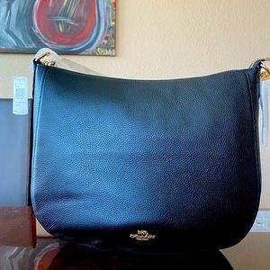 Black Coach Large Coach Tote. Brand new.  Leather. Never used.